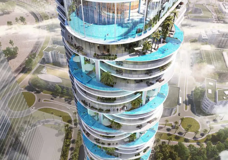 Aerial view of the tower and its rooftop pools above the neighbourhood